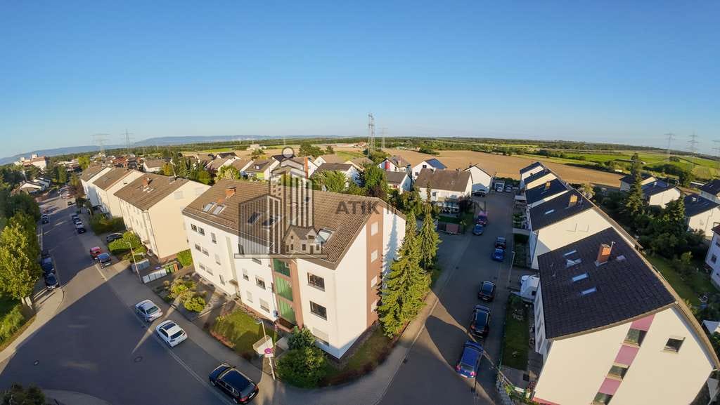 Immobilie in Ketsch - ATIK: Charmante 4-Zimmer-Erdgeschosswohnung mit sonnigem Südbalkon in ruhiger Feldrandlage - Bild 2