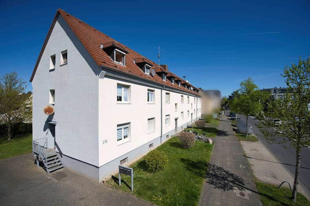 Immobilie in Sankt Augustin - Investieren in Hangelar: Vermietete EG-Wohnung mit Garten & Keller - Bild 1