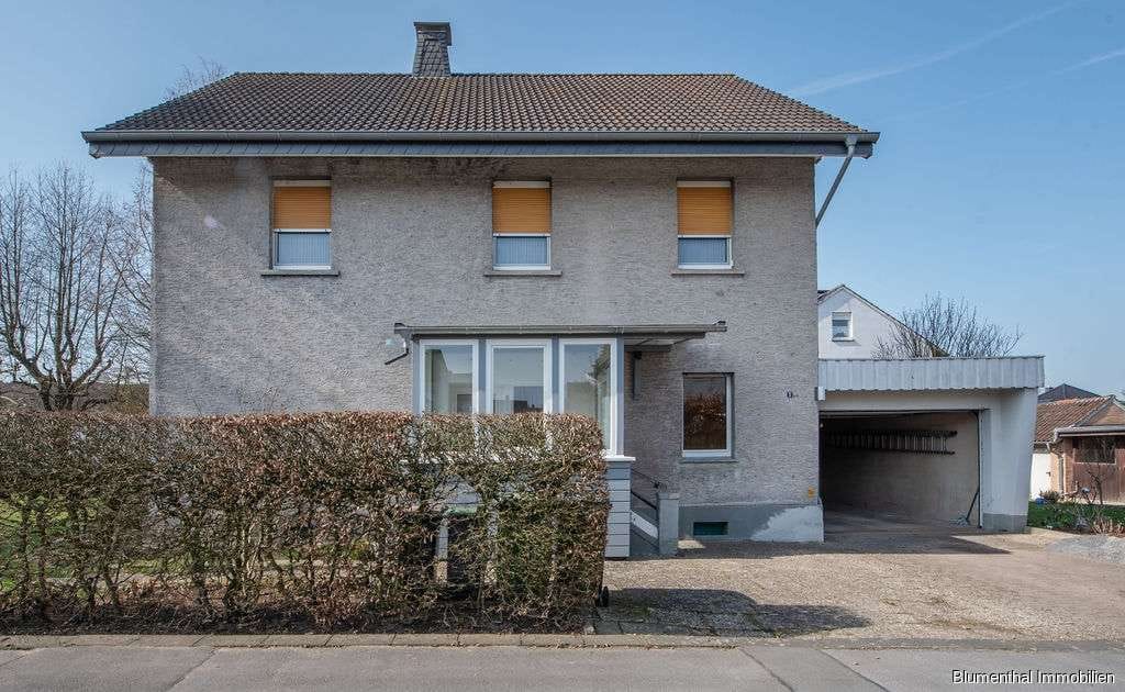 Immobilie in Enger - Zweifamilienhaus mit großzügigem Garten gen Süden in Westerenger - Bild 1