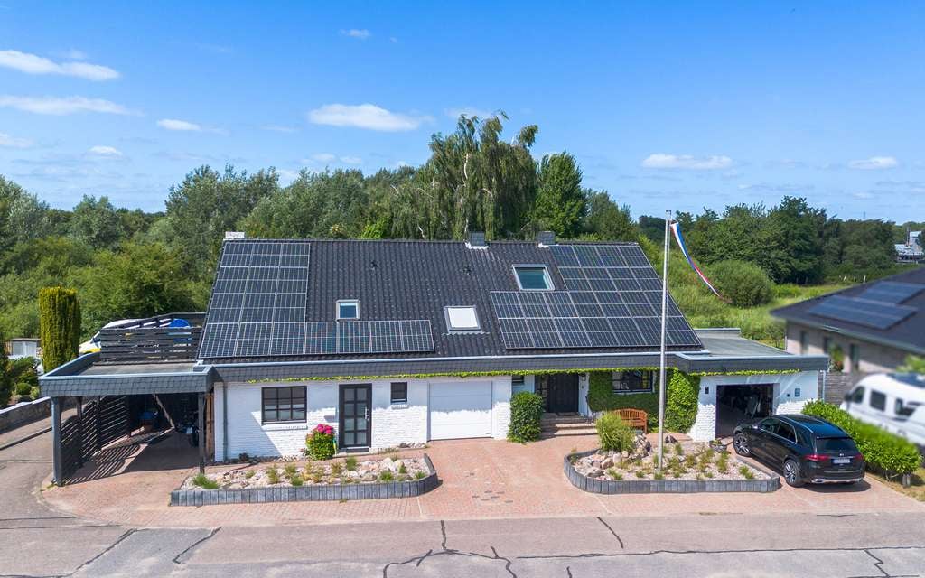 Immobilie in Osterrönfeld - Modernes und energieeffizientes Wohnen mit Kanalblick - Bild 0
