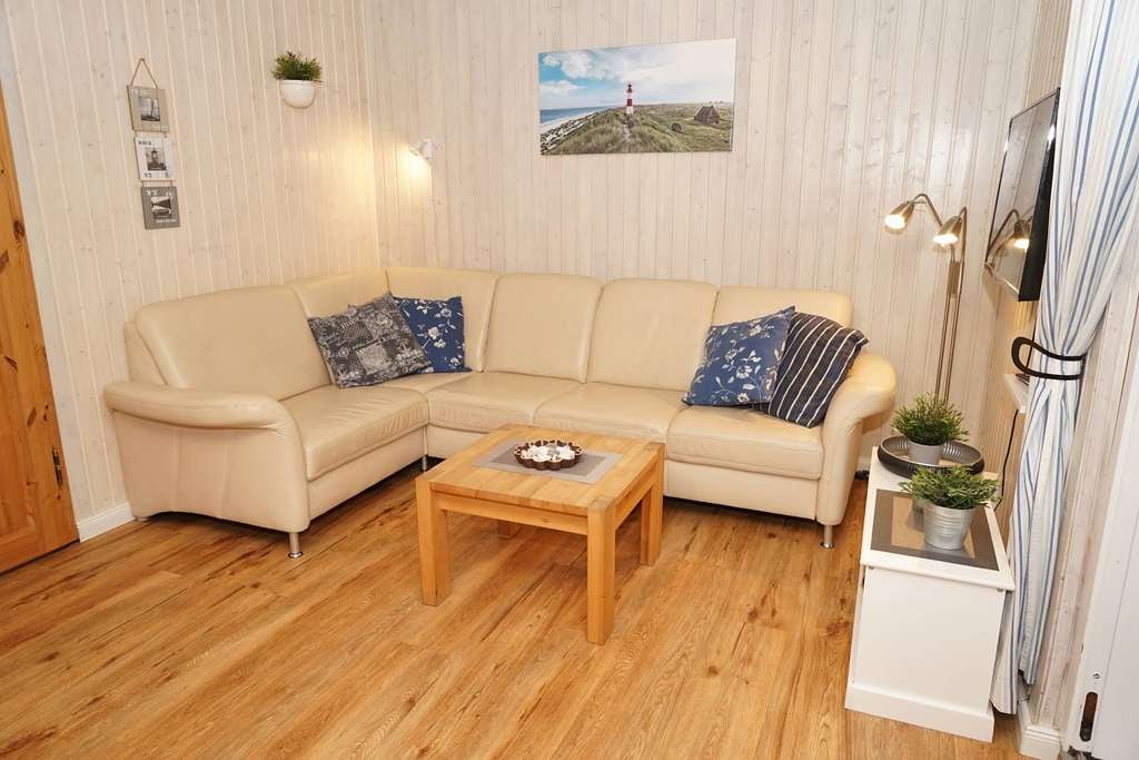 Immobilie in Damp - Blockhaus in TOP-Lage mit großem Grundstück und Wintergarten - Bild 1