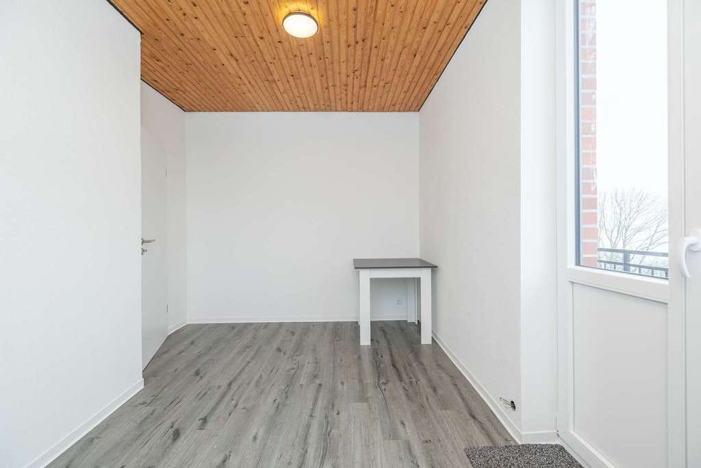 Immobilie in Meldorf - Stil trifft Geschichte | Renovierte 2-Zimmer-Wohnung im alten Schlosshotel - Bild 4