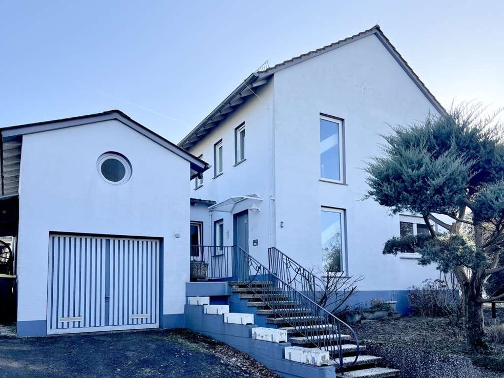 Immobilie in Detmold - Eigentumswohnung mit Garage und großem Garten - Bild 2