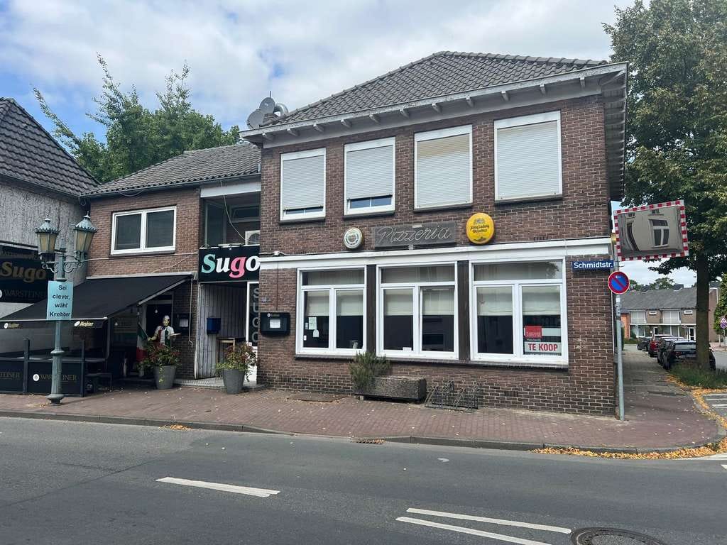 Immobilie in Emmerich am Rhein - Attraktives Mehrfamilienhaus mit 6 Schlafzimmers und Gewerbeeinheit (Pizzeria) im Erdgeschoss - Bild 1