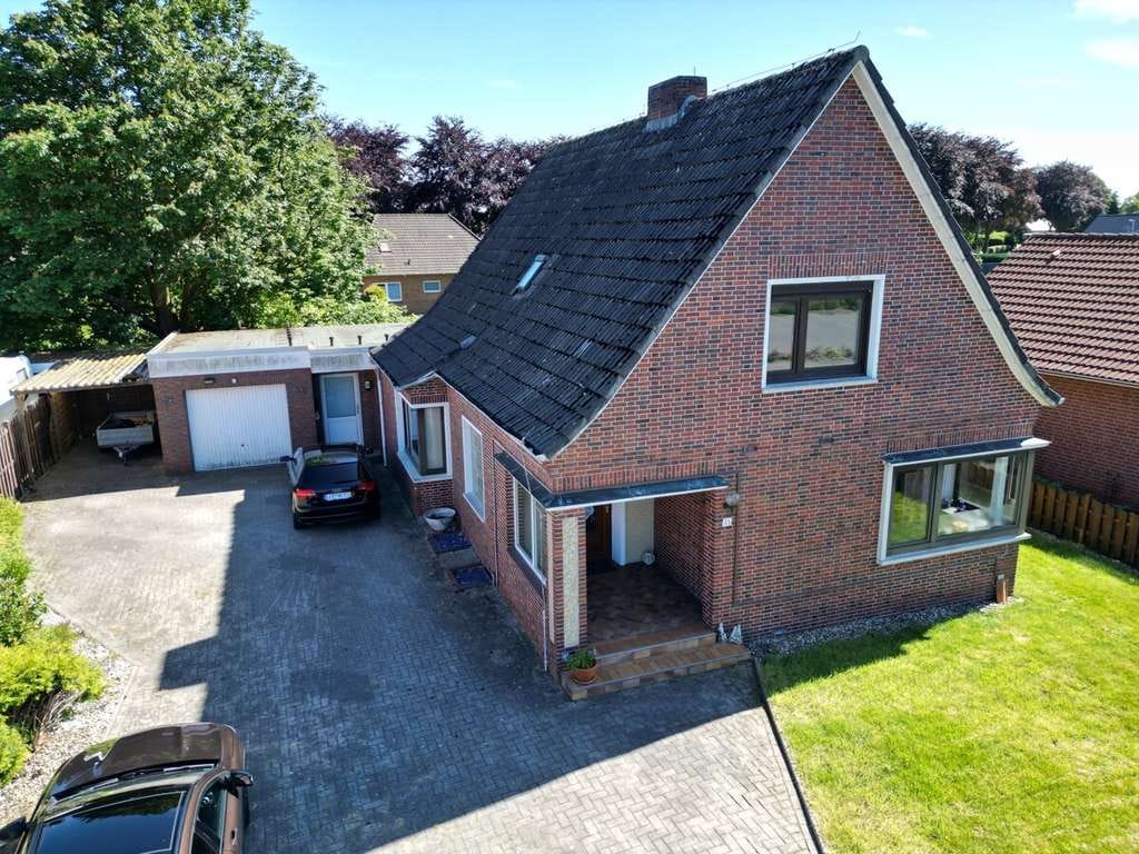 Immobilie in Moormerland - Einfamilienhaus mit Einliegerwohnung in
guter - zentraler Wohnlage - Bild 4