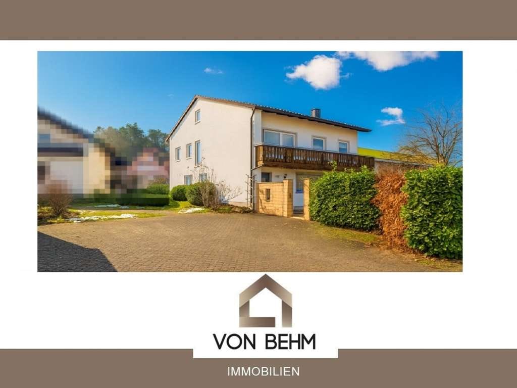 Immobilie in Dollnstein - Großzügiges Zweifamilienhaus mit  Garagen und vielseitigen Nutzungsmöglichkeiten - Bild 0