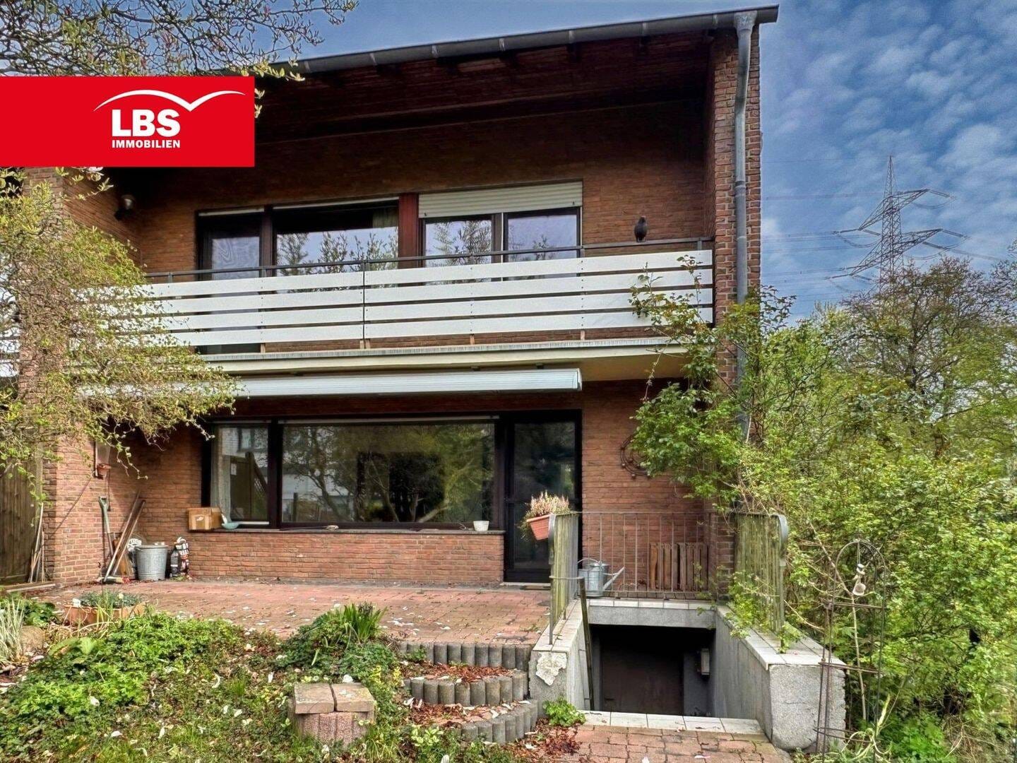 Immobilie in Hünxe - Viel Platz für die Familie! - REH mit Garage, Carport und Garten - Bild 2