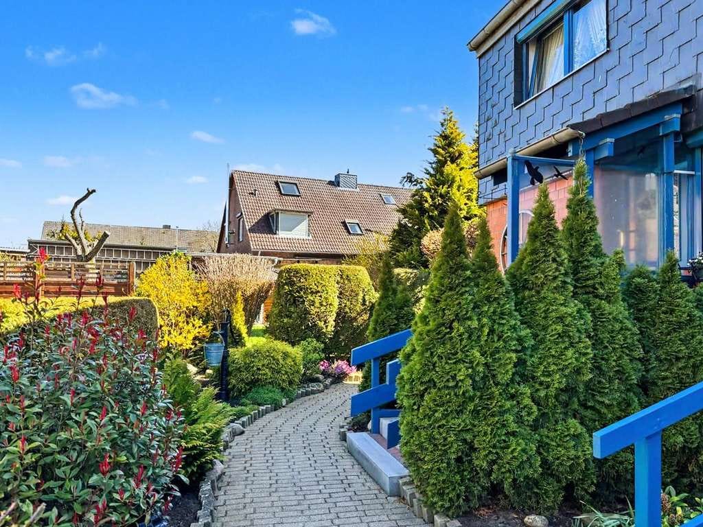 Immobilie in Quarnbek - Wohnkomfort mit Charakter – Reihenendhaus mit Kamin und Garten in Kiel - Bild 1