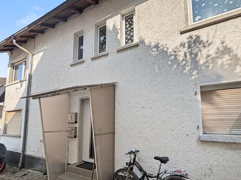 Immobilie in Ötigheim - Ruhig gelegenes, vermietetes Zweifamilienhaus in Ötigheim – Wohnen, vermieten oder kombinieren - Bild 1