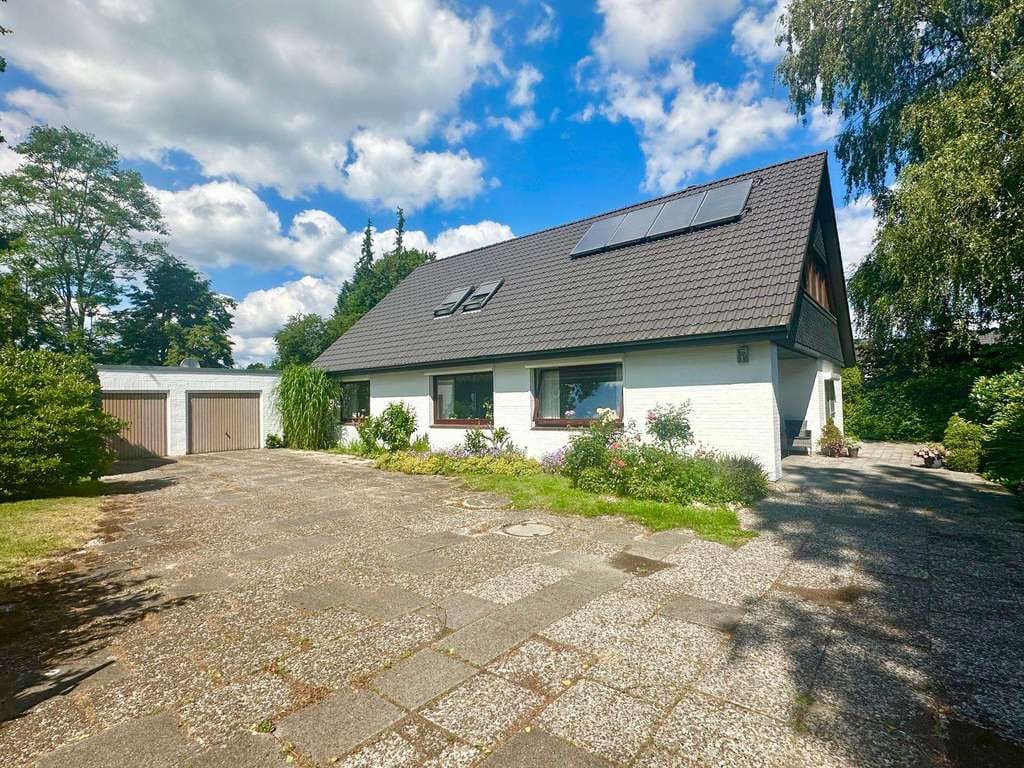 Immobilie in Ellerbek - Großzügiges und saniertes Einfamilienhaus mit viel Potenzial in Sackgassenendlage - Bild 0