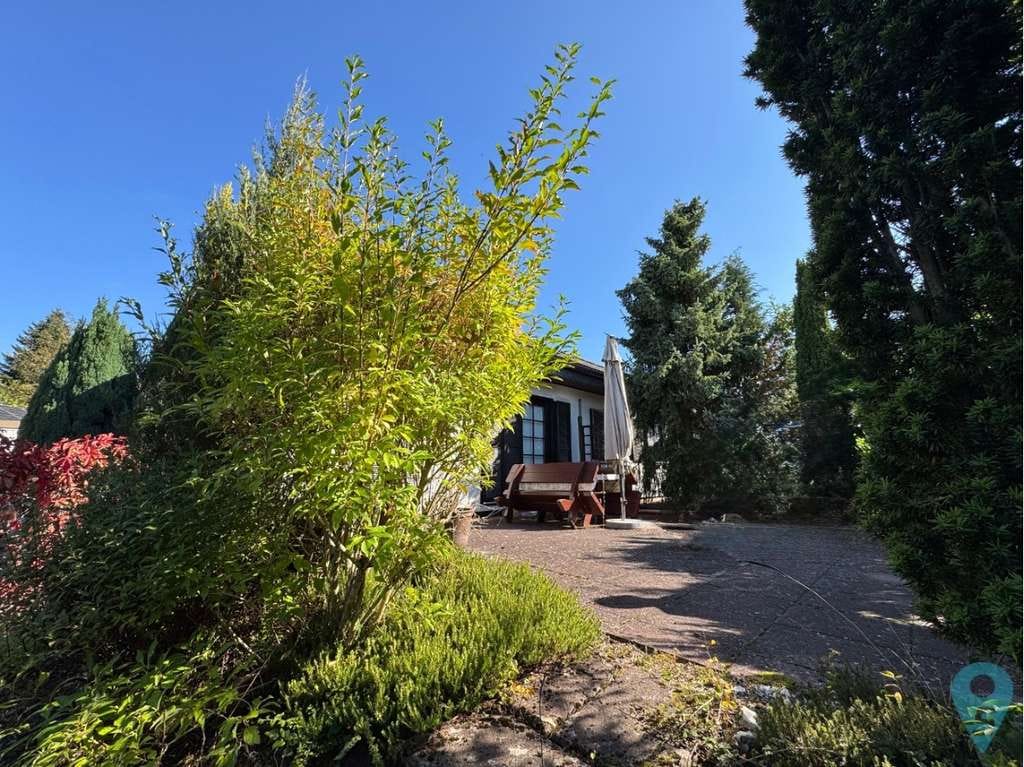 Immobilie in Hennweiler - Ruhe, Komfort & Natur in Hennweiler: Gepflegtes EFH im Landhausstil mit Kamin & Doppelgarage - Bild 4