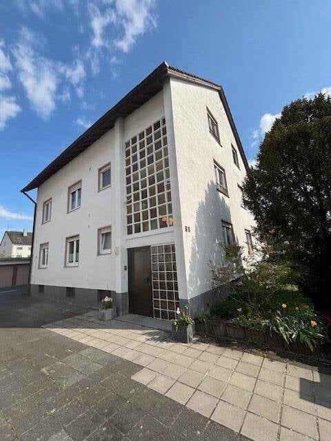 Immobilie in Pfungstadt - Großes Dreifamilienhaus in ruhiger, zentraler Wohnlage im Süden von Pfungstadt - Bild 2