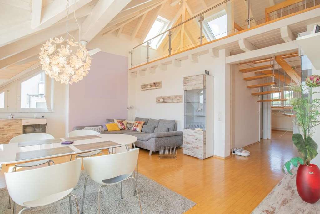Immobilie in Heuweiler - Stilvolle Maisonette-Wohnung mit Galerie und offenem Wohnkonzept - Bild 0