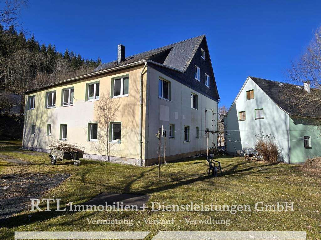 Immobilie in Wurzbach - Mehrfamilienhaus mit 8 Einheiten, Gewerbehalle & 2.500m² Teich – vielseitiges Immobilienpaket - Bild 0