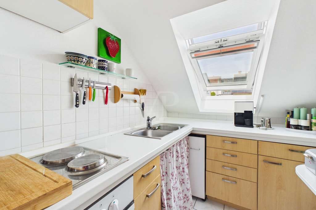 Immobilie in Sulzbach am Main - Kapitalanlage mit langjähriger Mieterin – gepflegte Dachgeschosswohnung mit Balkon & Stellplätzen - Bild 3