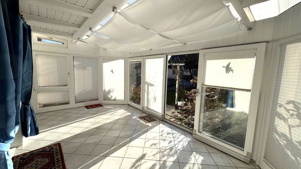 Immobilie in Schwarzenbruck - Charmantes Einfamilienhaus im Komponistenviertel mit Wintergarten - Bild 4
