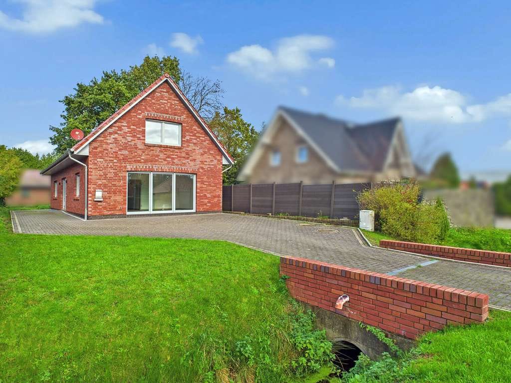 Immobilie in Leezdorf - Neuwertiges Zweifamilienhaus in ruhiger Lage von Leezdorf - Bild 1