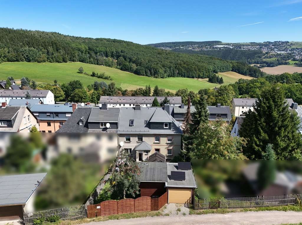 Immobilie in Lauter-Bernsbach - Kaufen, einziehen, wohlfühlen! Gemütliches, saniertes Reihenhaus mit Pool & Garage in Lauter - Bild 4