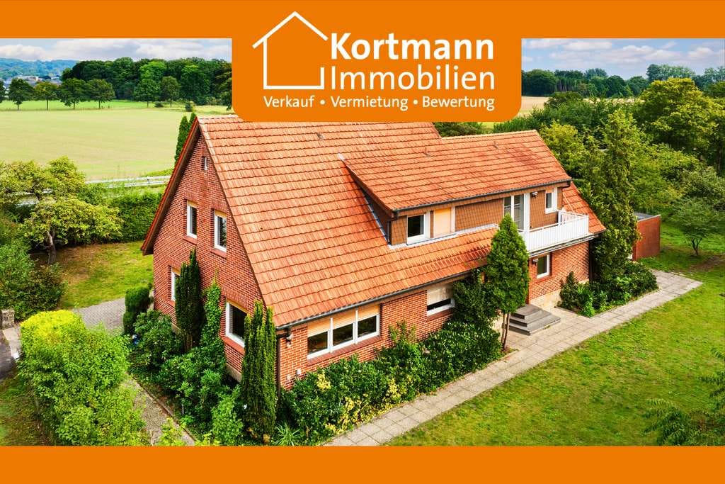 Immobilie in Lengerich - Vielseitiges Zweifamilienhaus mit großem Grundstück im grünen Außenbereich von Lengerich - Bild 0