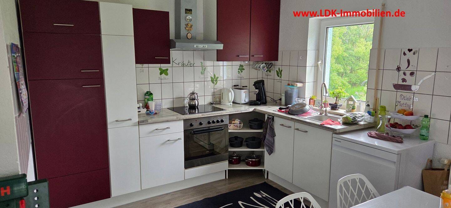 Immobilie in Haiger - Haiger-Allendorf: 5 Fam.-Haus, z.Zt. kpl, vermietet mit Keller und 4 x Garage - Bild 4