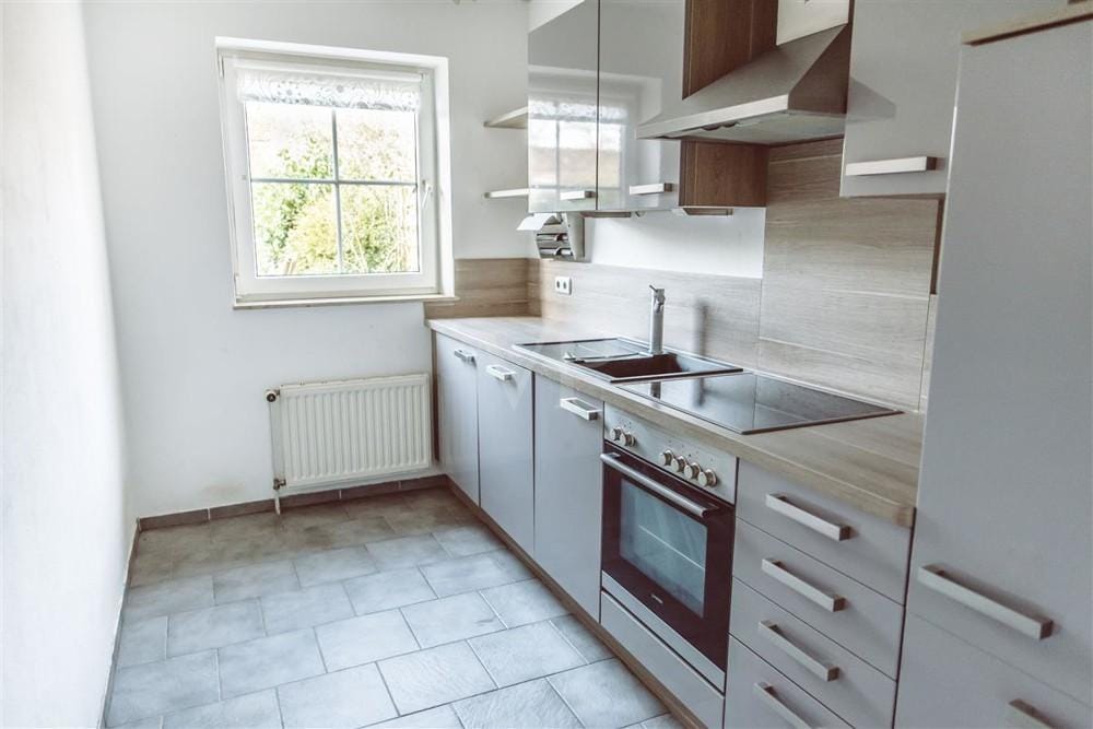 Immobilie in Adendorf - Attraktive 1-Zimmer-Wohnung mit Garten in ruhiger Parklage – Vermietetes Investment in Adendorf - Bild 4
