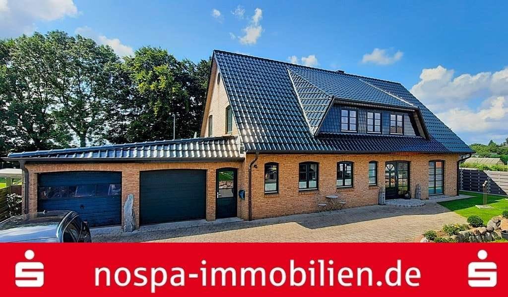 Immobilie in Hamdorf - TOP-Gepflegtes und wertiges Einfamilienhaus mit Kaminofen, Doppelgarage und großem Garten! - Bild 0