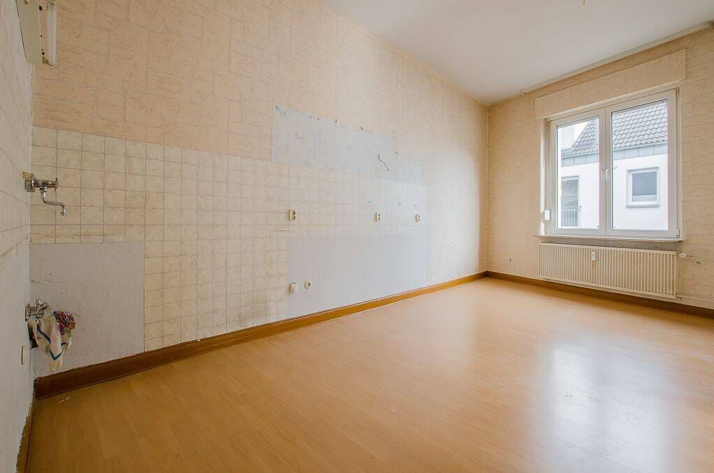 Immobilie in Unna - Attraktives Wohn- und Geschäftshaus mit Garage und Stellplatz als Anlageoption - Bild 1