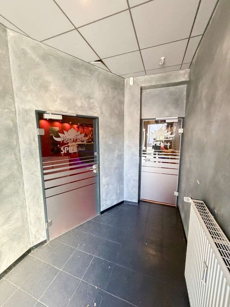Immobilie in Aldenhoven - Wohn- und Geschäftshaus in zentraler Lage von Aldenhoven mit vielseitiger Gewerbeeinheit und zwei gr - Bild 2