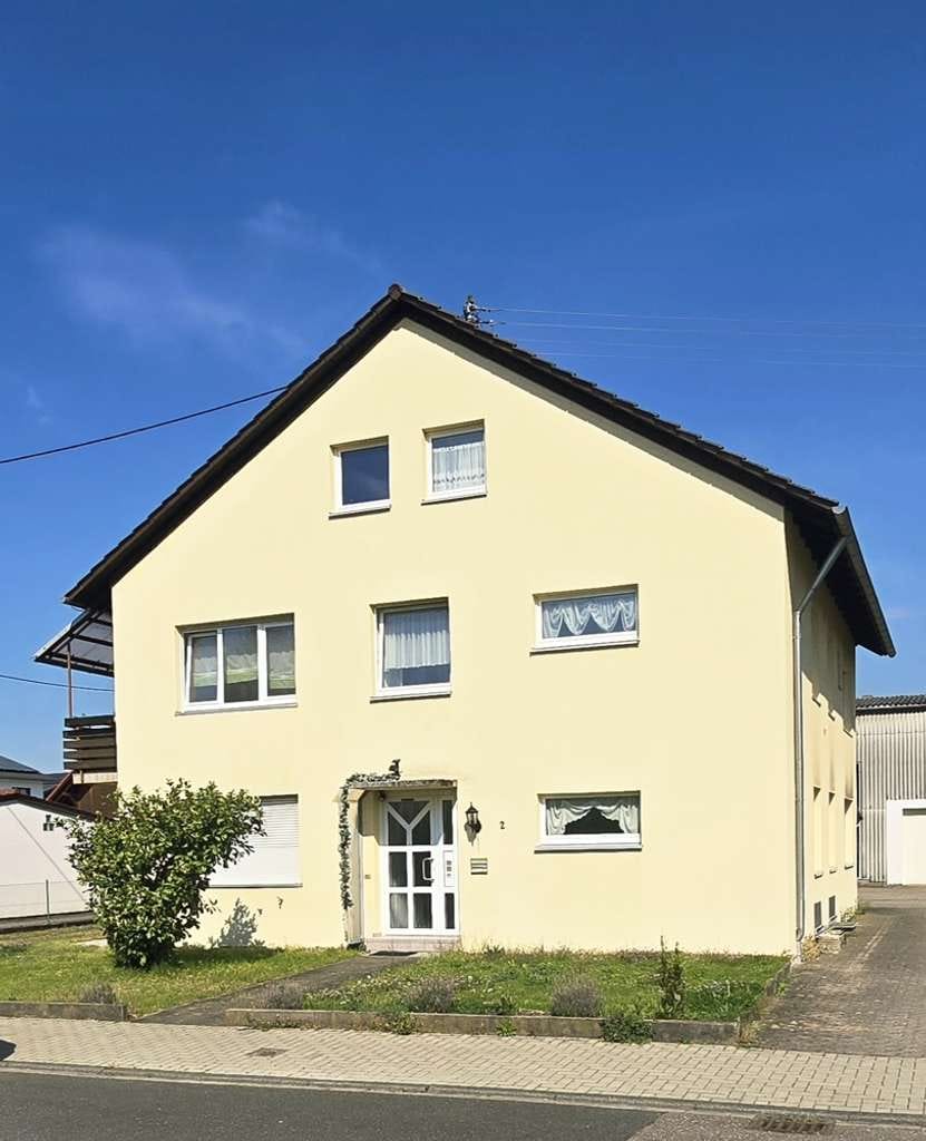 Immobilie in Graben-Neudorf - gepflegtes Zweifamilienhaus in ruhiger Lage - Bild 1