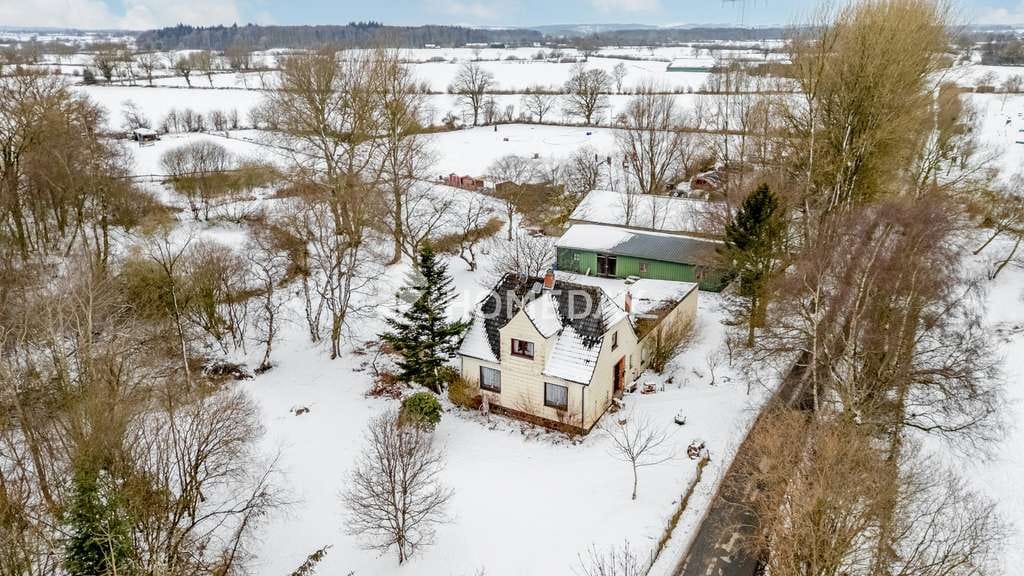 Immobilie in Goosefeld - Charmantes Einfamilienhaus mit Weitblick auf großzügigem Naturgrundstück - Bild 0