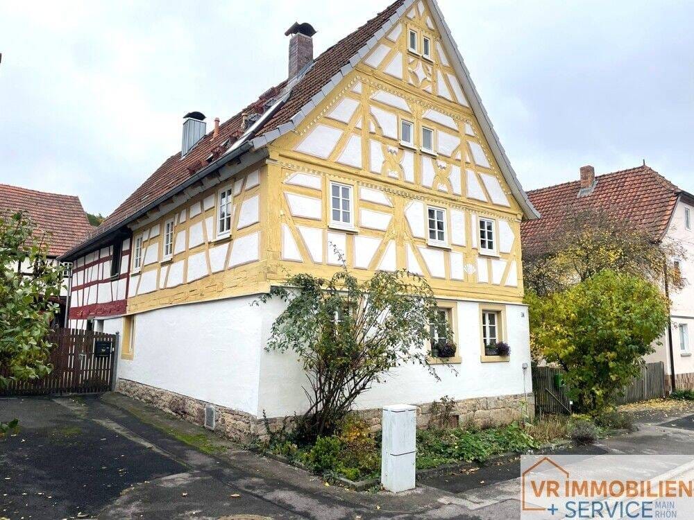 Immobilie in Oberelsbach - Vergangenheit bewahren und Zukunft genießen! Wohnhaus mit Scheune und Garten in 97656 Unterelsbach! - Bild 0