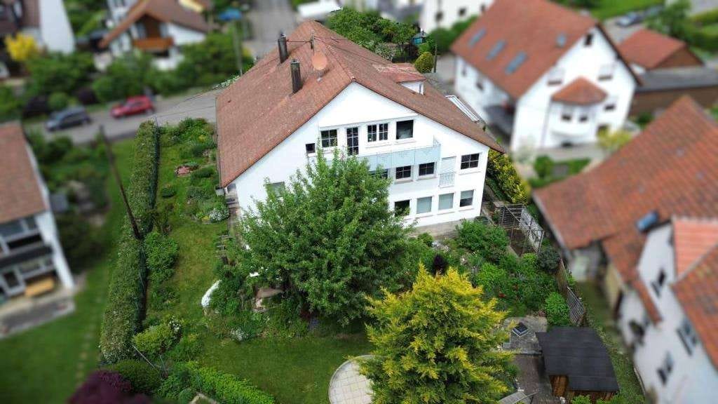 Immobilie in Kusterdingen - Wohnhaus mit 3 Wohneinheiten, Gewerbeeinheit, Doppelgarage und wunderschönem Garten - Bild 4