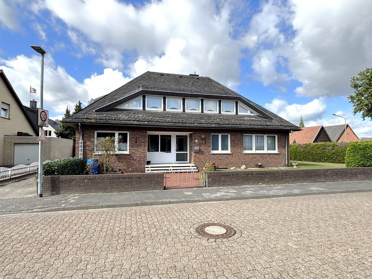 Immobilie in Lohne - * PROVISIONSFREI für Käufer * Wohlfühlen in zentraler Lage - Ein-/Zweifamilienhaus mit Wintergarten - Bild 1