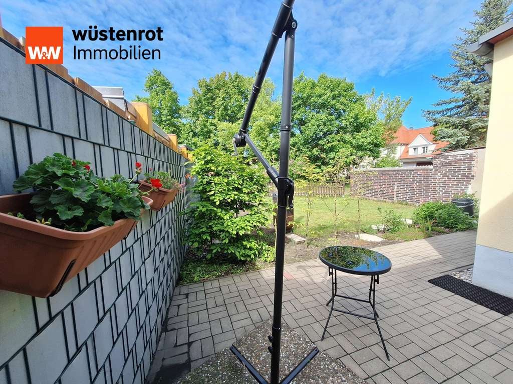 Immobilie in Gräfenhainichen - Charmantes Reihenmittelhaus mit schönem Garten in zentraler Wohnlage von Zschornewitz - Bild 1