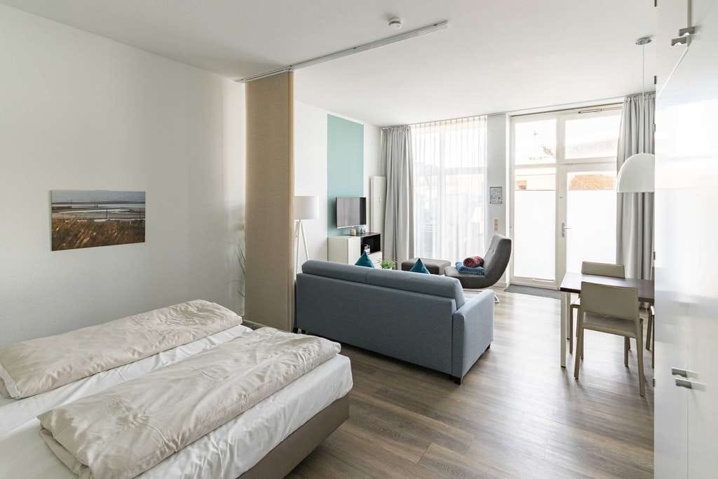 Immobilie in Wangerooge - Exklusives Meerblick-Apartment auf Wangerooge: Große Terrasse, Sauna – stilvoller Inselluxus dire... - Bild 4