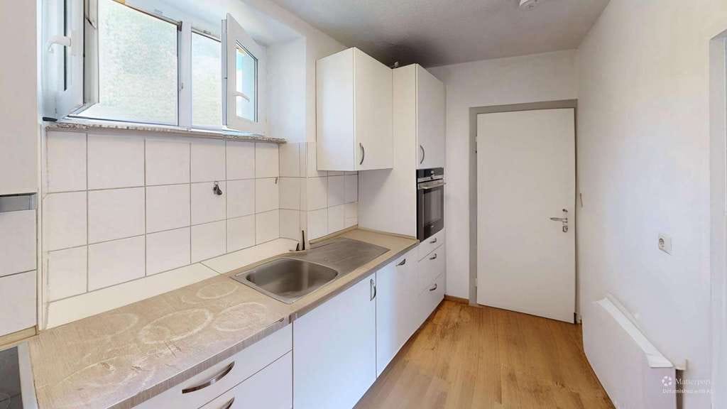 Immobilie in Otterbach - Attraktives Gesamtpaket: Vermietetes Einfamilienhaus mit Baugrundstück in Otterbach - Bild 4