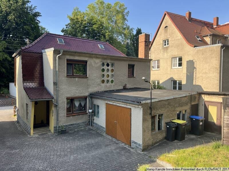 Immobilie in Nünchritz - Einfamilienhaus mit Garage, Nebengebäuden und überdachter Terrasse - Bild 2