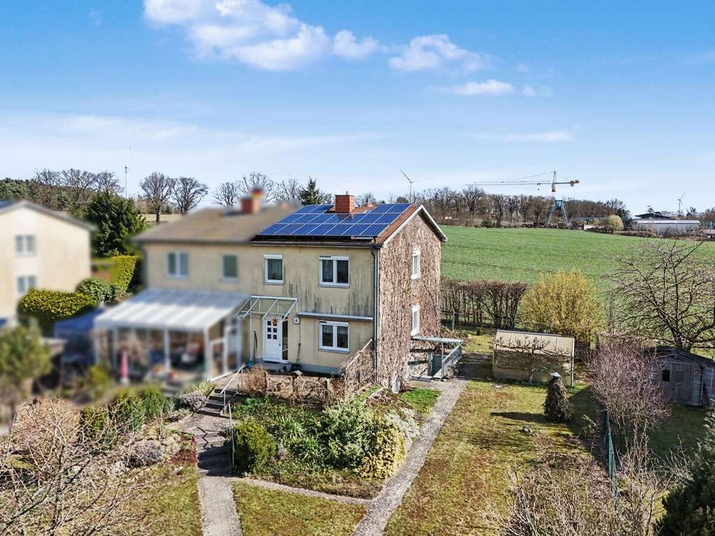 Immobilie in Prötzel - Familienfreundliche Doppelhaushälfte mit Kamin, Wintergarten und Blick ins Grüne! - Bild 1