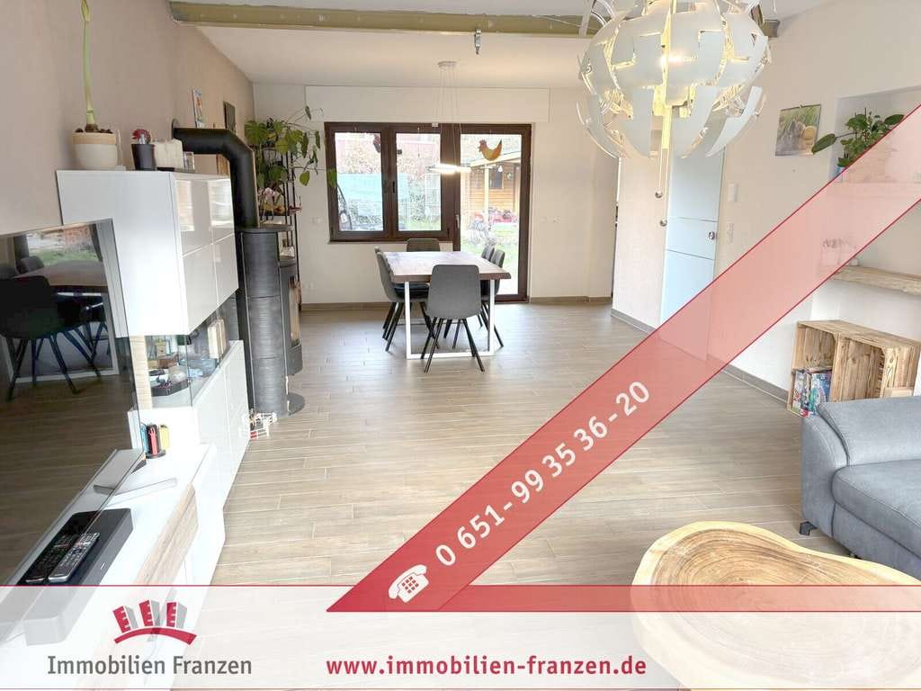 Immobilie in Hentern - Modernisiertes Einfamilienhaus mit Kamin, Garten & Garage - Bild 0