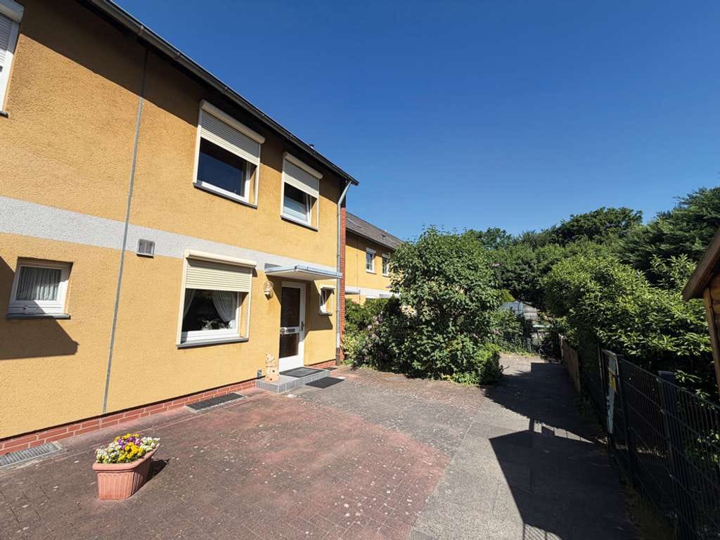 Immobilie in Wahlstedt - Solides Reihenhaus mit Südwest-Garten & Carport! - Bild 1