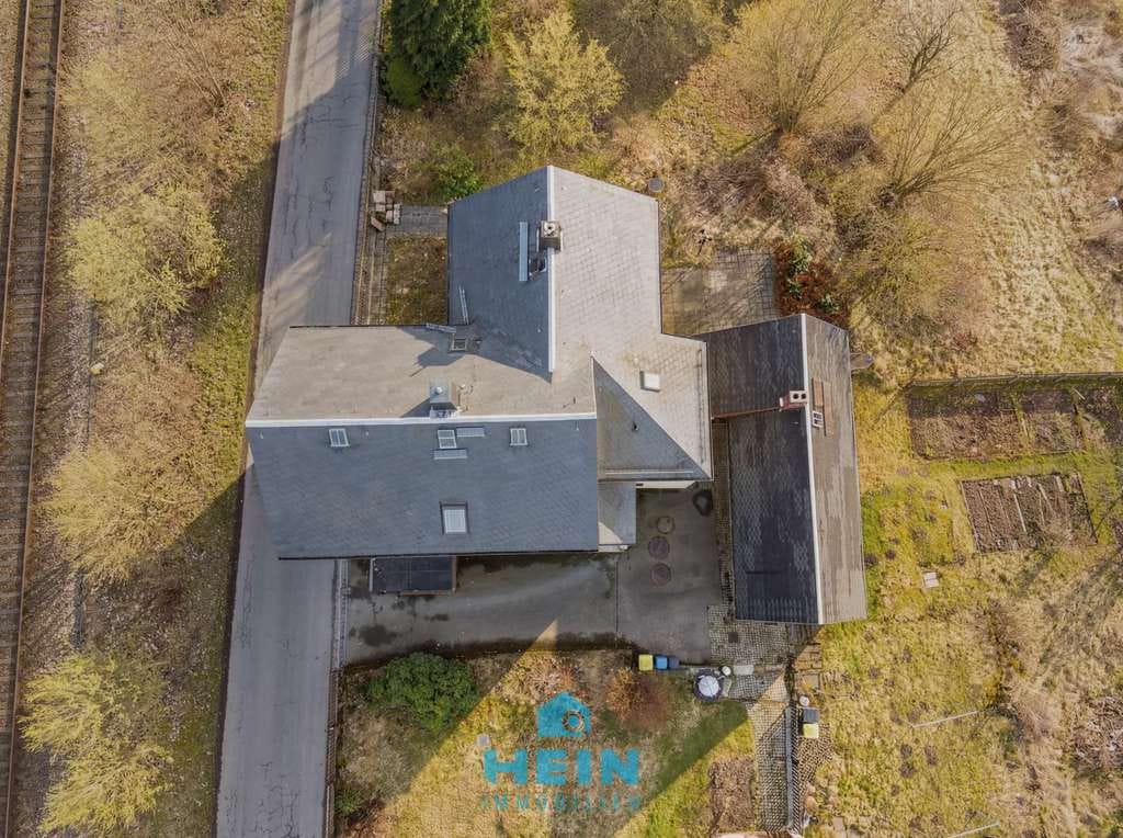 Immobilie in Lößnitz - Stabile Basis, starkes Potenzial – Dreifamilienhaus im Erzgebirge - Bild 4