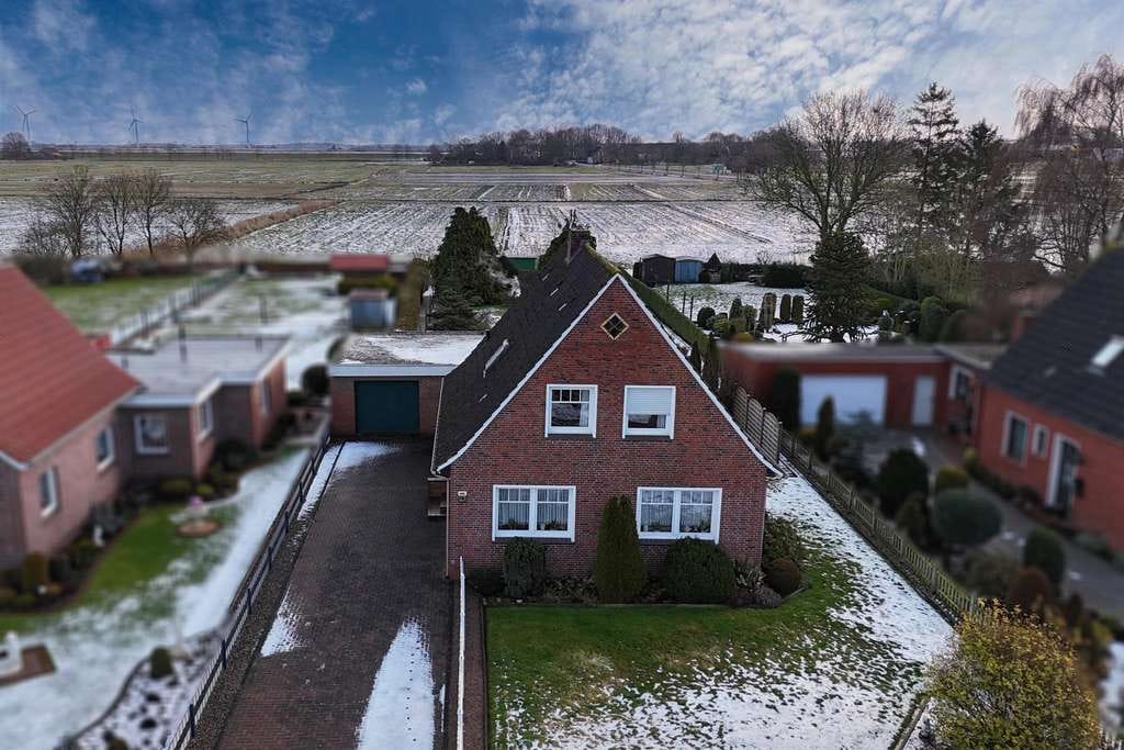 Immobilie in Jemgum - Familienfreundliches Zuhause mit großem Garten - Bild 1