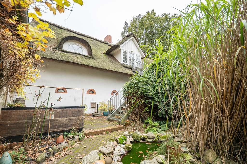 Immobilie in Kutenholz - Viel Platz & Potenzial: Ein- oder Zweifamilienhaus mit großer Scheune in Kutenholz - Bild 1