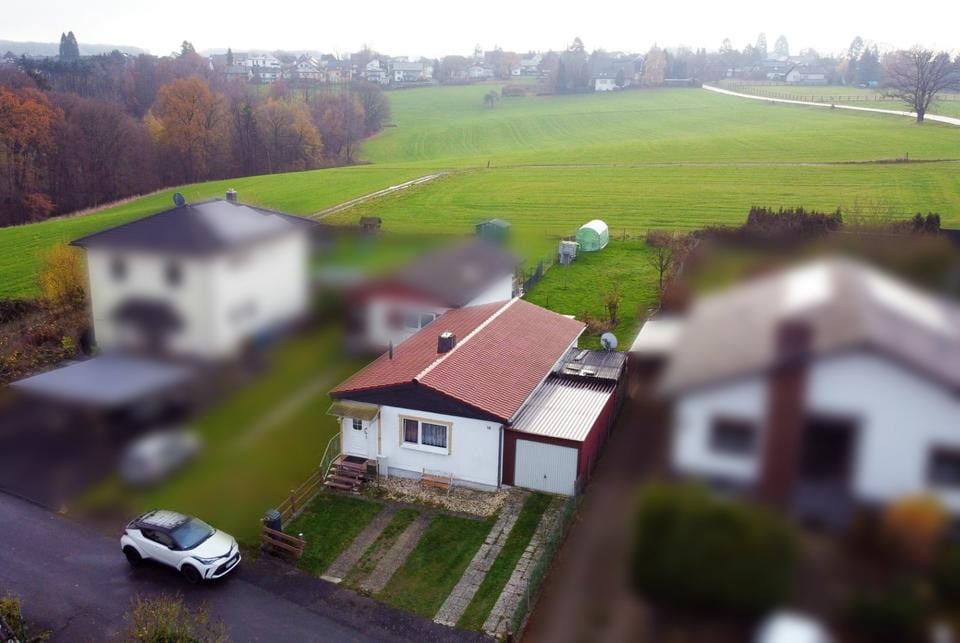 Immobilie in Asbach - Zuhause für Naturliebhaber: Ihr 2-Zimmer Einfamilienhaus - Terrasse, Garten & Garage in Buchholz - Bild 0