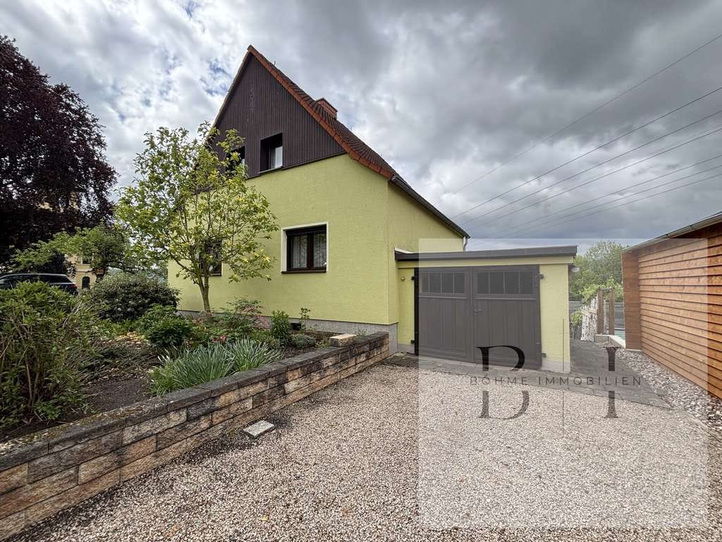 Immobilie in Saalfeld/Saale - Wohnen im Grünen – Freistehendes Einfamilienhaus mit großem Grundstück, Terrassen & Weitblick - Bild 1