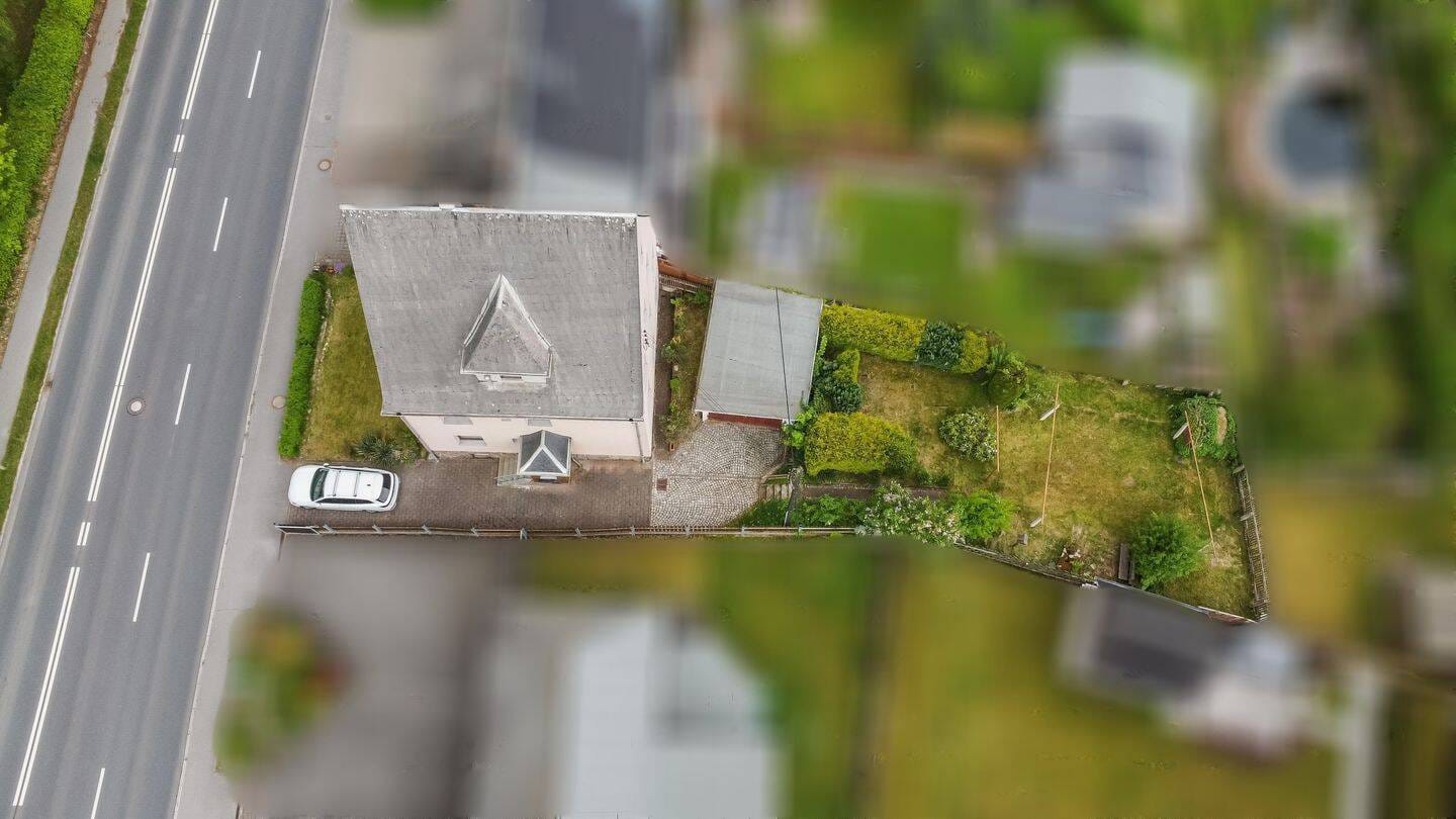 Immobilie in Aue-Bad Schlema - Viel Platz für die ganze Familie - Charmantes Reihenendhaus mit großem Potenzial - Bild 1