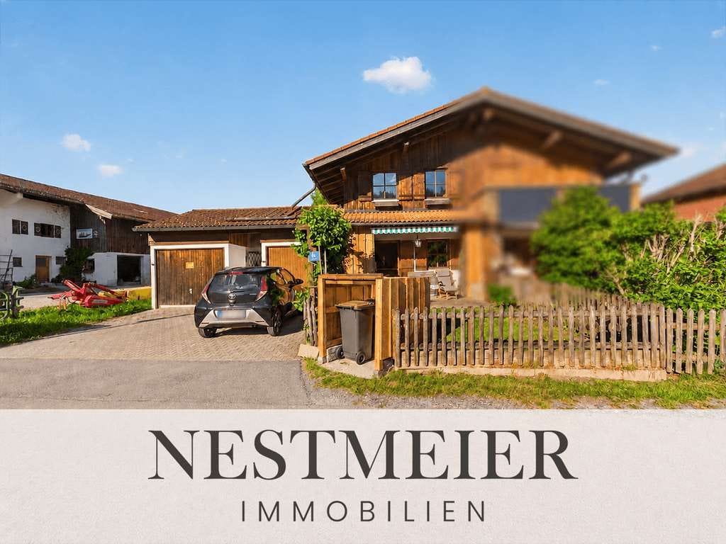 Immobilie in Schleching - Gepflegte Doppelhaushälfte mit Süd-West-Garten und modernisierten Wohnbereichen in ruhiger Lage - Bild 0