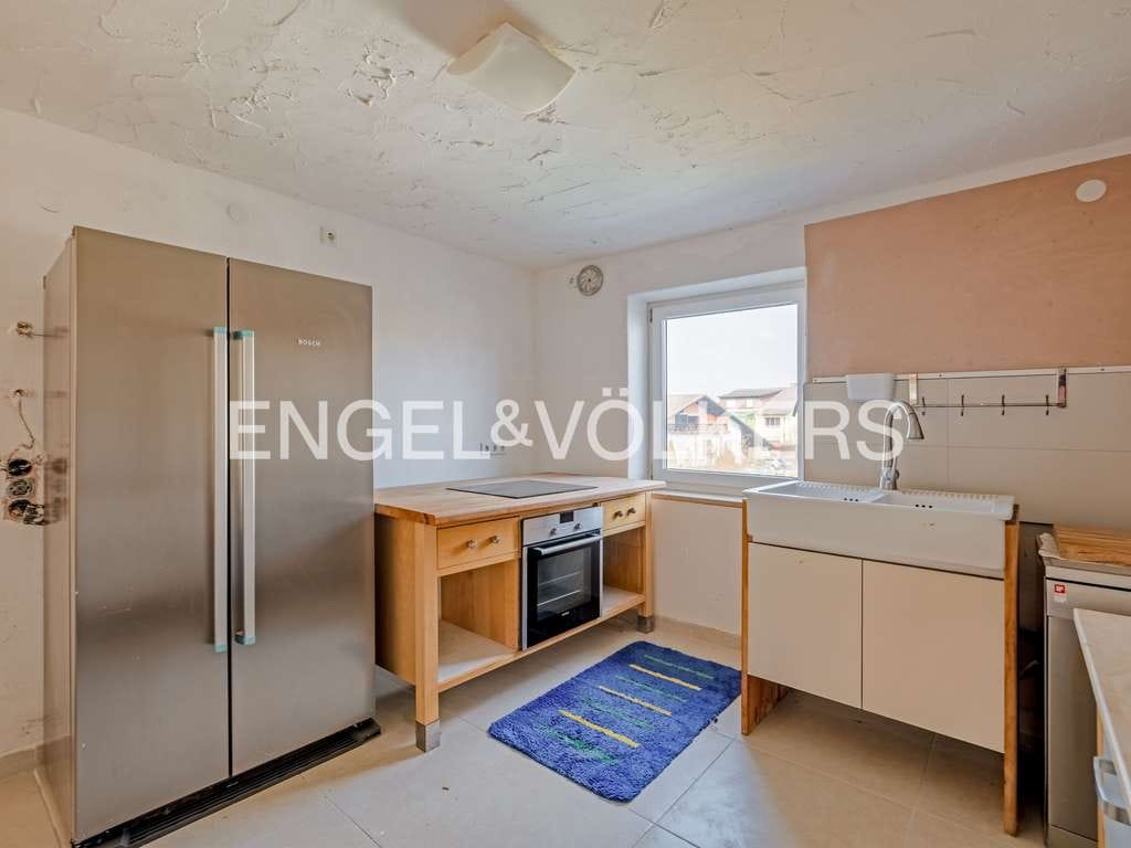 Immobilie in Manching - Vielseitiges Zweifamilienhaus mit Ausbaupotenzial - Bild 3