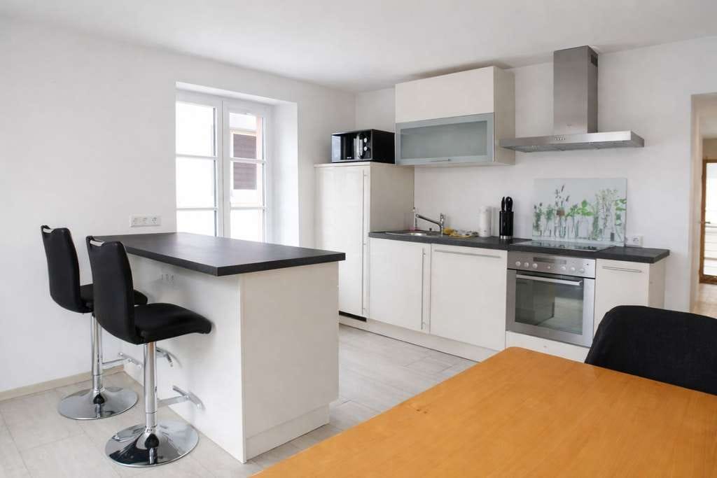 Immobilie in Maulburg - Großzügige 5-Zimmer-Dachgeschosswohnung in einem denkmalgeschützten Wohnensemble in Maulburg - Bild 2