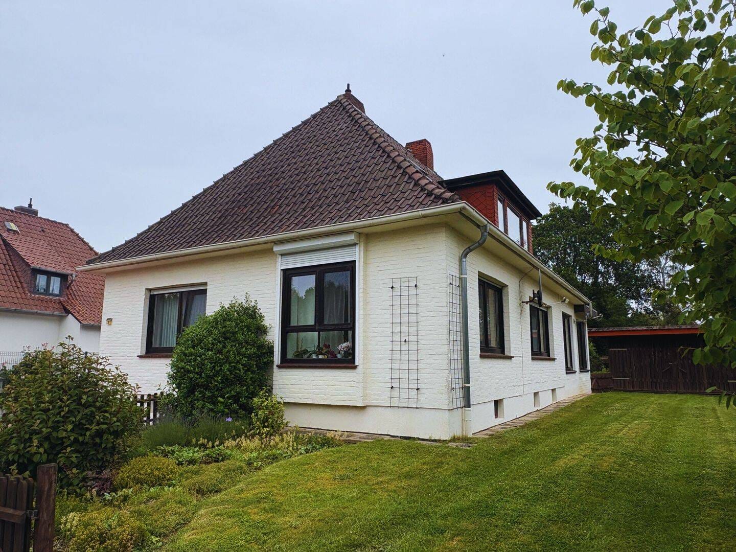 Immobilie in Hilgermissen - Bungalow mit besonderem Charme und idyllischem Garten in zentrumsnaher Lage - Bild 1